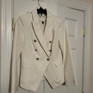 Women’s white double-breasted blazer. Gold-plated buttons. Gold piping inside.